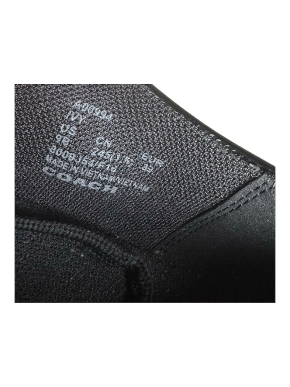 Coach sleek black